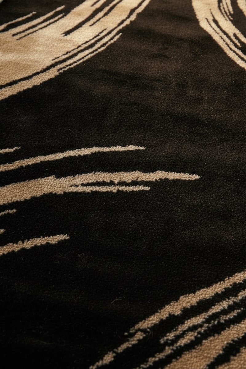 Black and Gold Abstract Glam Area Rug styled in a room