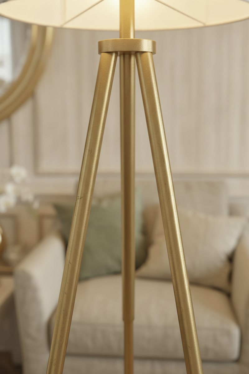 Brushed Gold Tripod Floor Lamp styled in a room