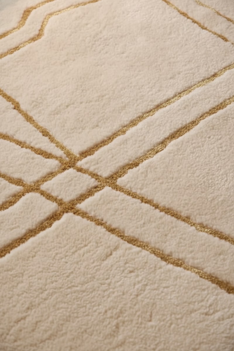 Ivory & Gold Glam Area Rug styled in a room
