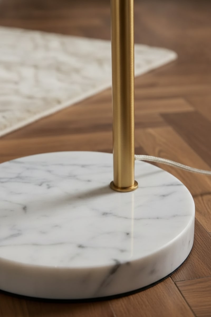 Gold Arc Floor Lamp with Marble Base styled in a room