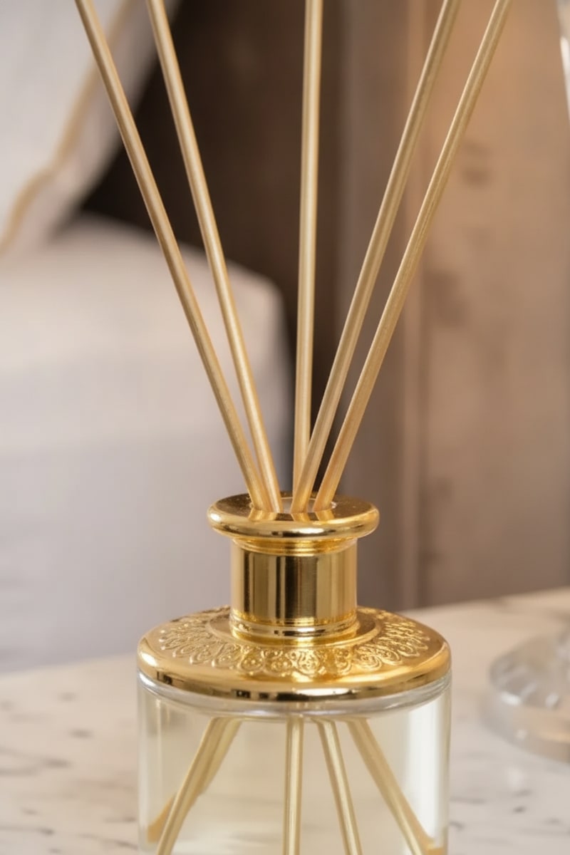 Gold Reed Diffuser Luxury Home Scent Set styled in a room
