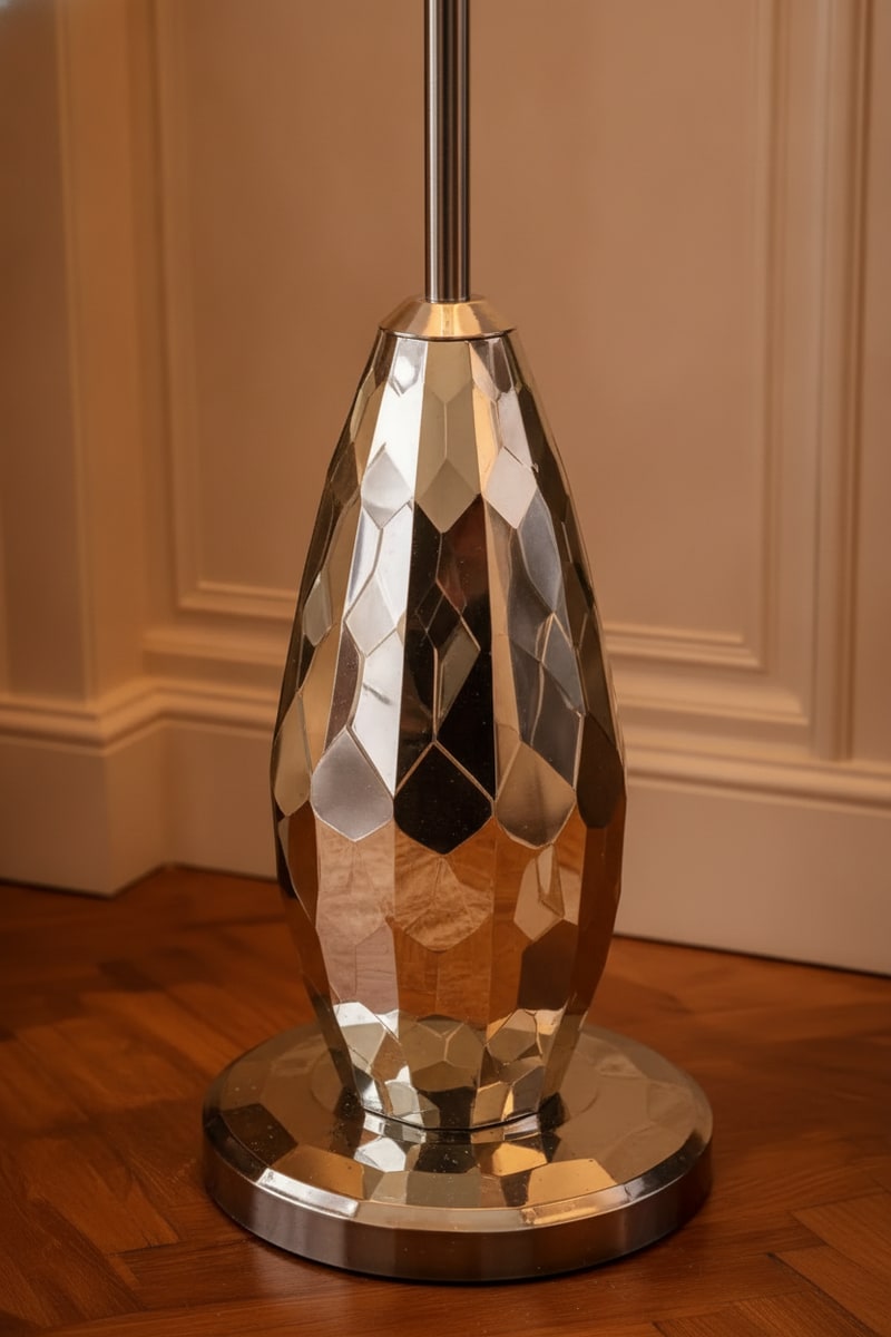 Mirrored Base Torchiere Floor Lamp styled in a room