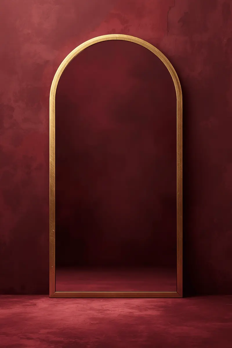 Luxury oversized arched gold frame mirror transforming a living room wall
