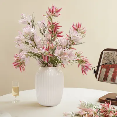 Pink Artificial Flowers in White Ribbed Vase Elegant Faux Floral Arrangement for Home Art Decor