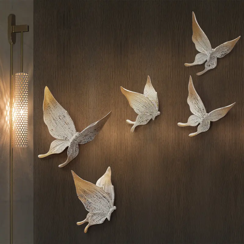 White & Gold 3D Butterfly Wall Decor Set, 5 Piece styled in a room