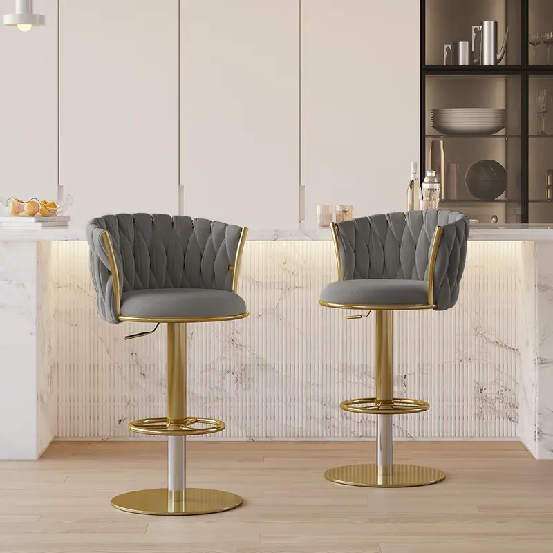 Grey Velvet Swivel Bar Stools, Set of 4 styled in a room
