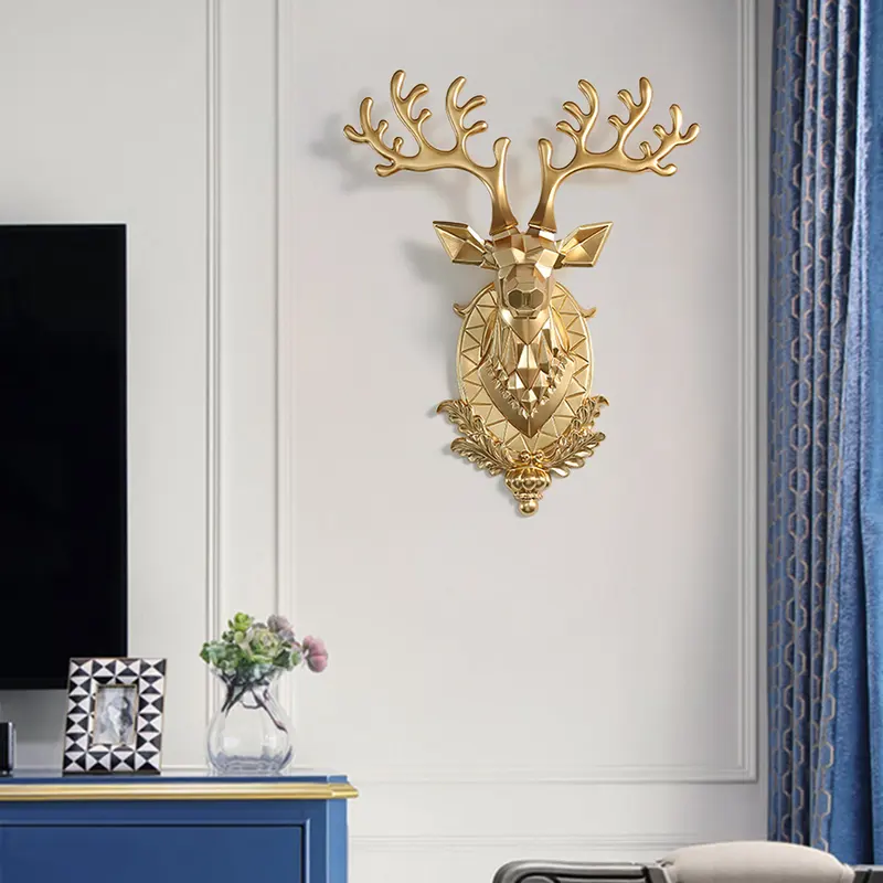 Gold Deer Head Wall Sculpture styled in a room