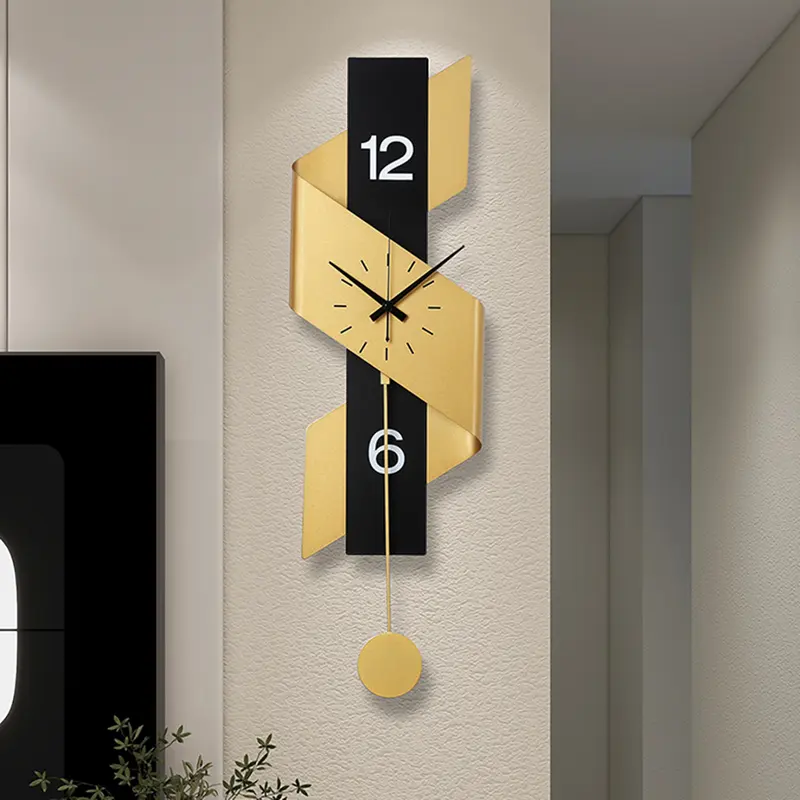 Gold & Black Oversized Ribbon Wall Clock styled in a room