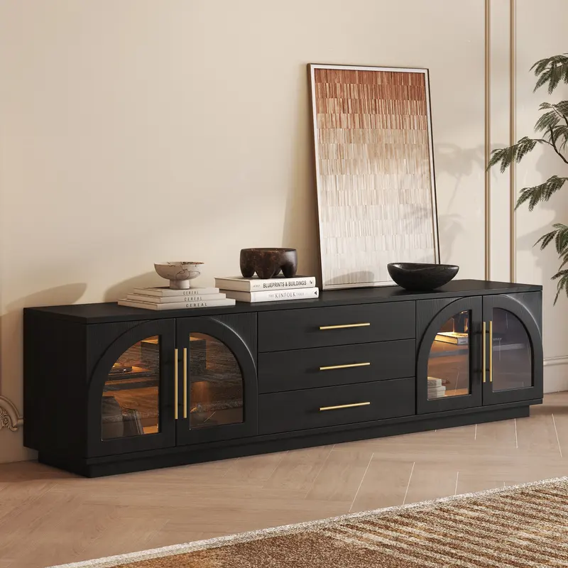 Arune 80" Black TV Stand, Arched Glass & LED styled in a room